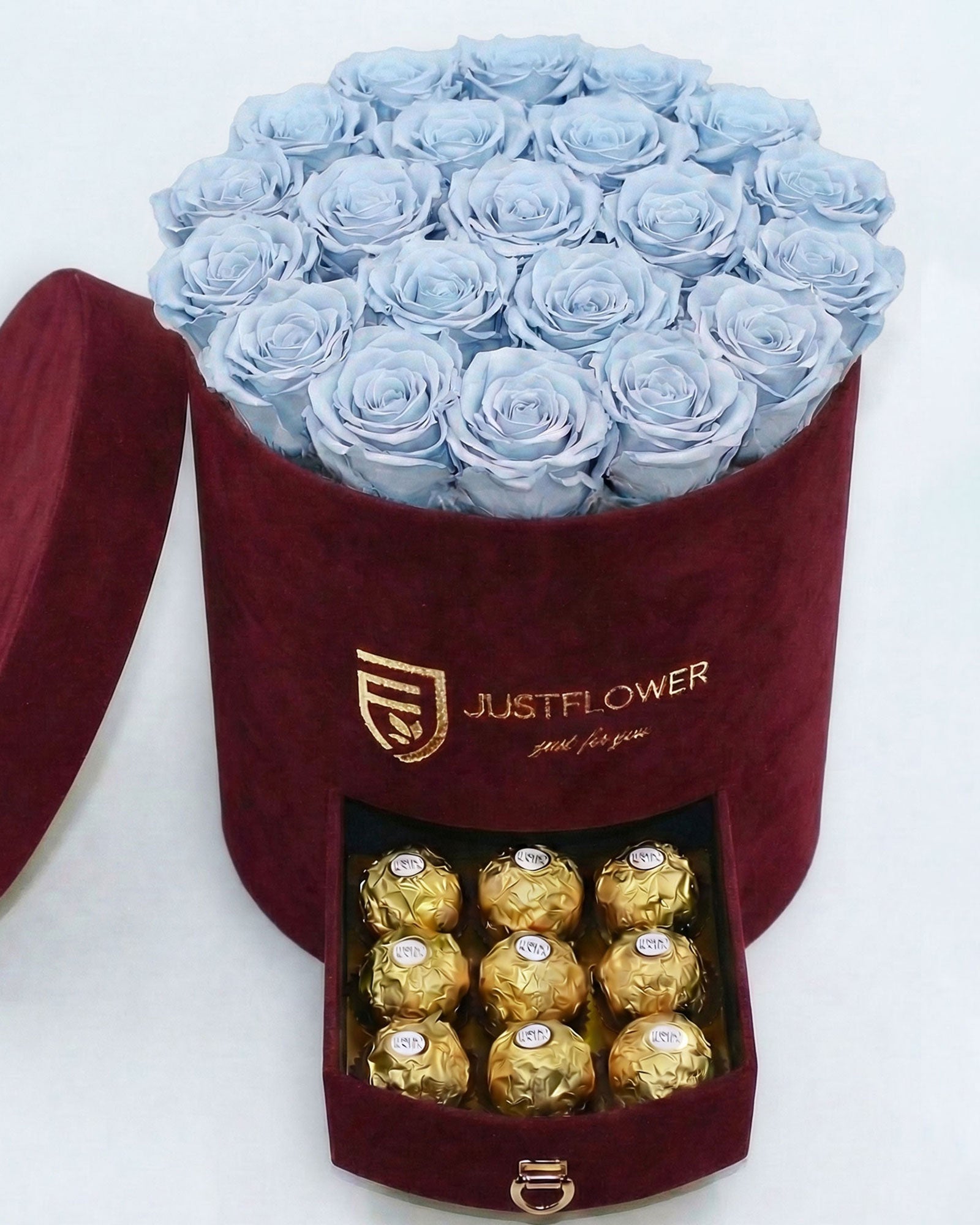 Rosenbox Rund Large Burgund Velvet mit hellblauen Infinity Rosen und integrierter Schublade – kreative und kontrastreiche Blumenbox