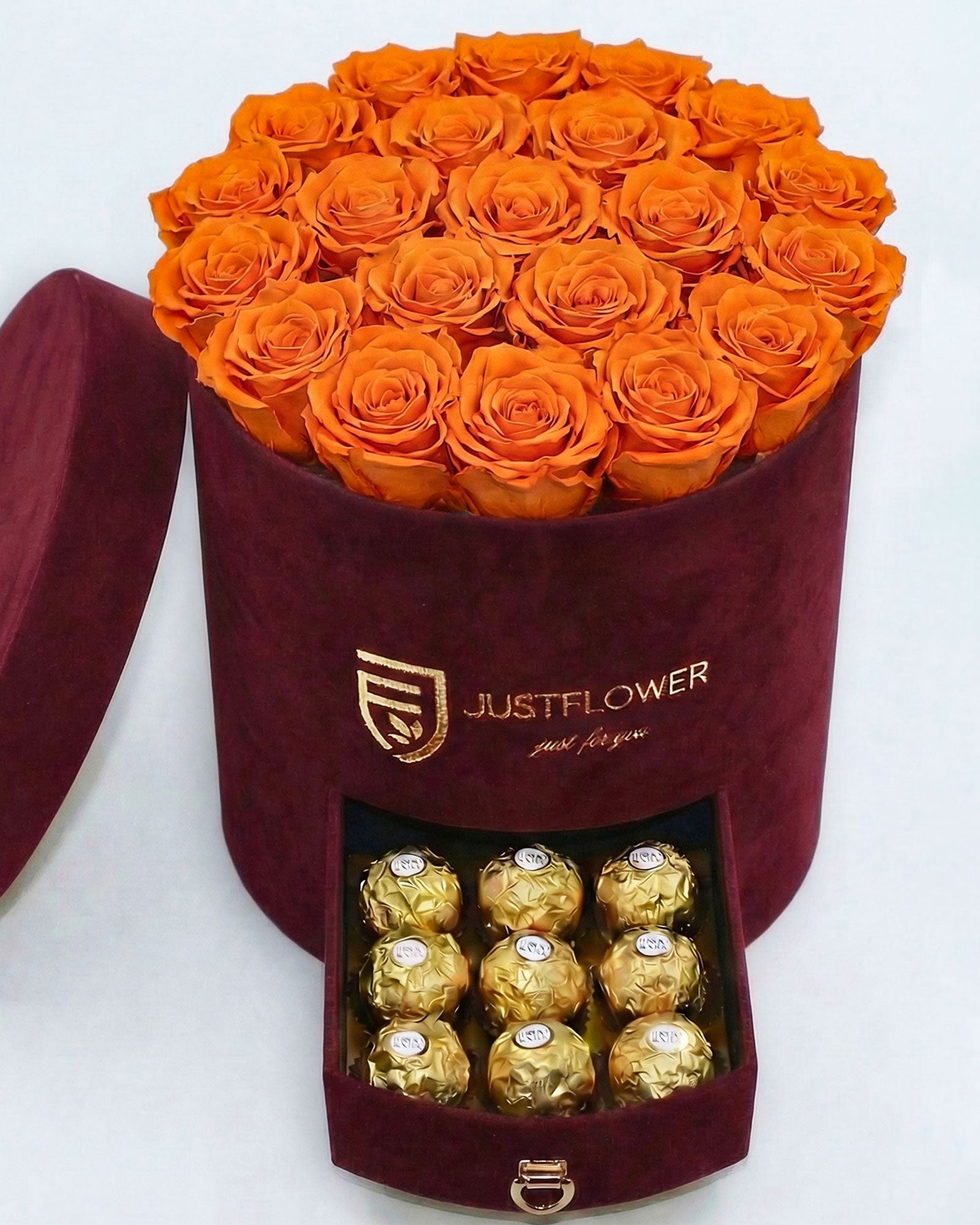 Rosenbox Rund Large Burgund Velvet mit orangefarbenen Infinity Rosen und Schublade – lebendige und auffällige Geschenkidee