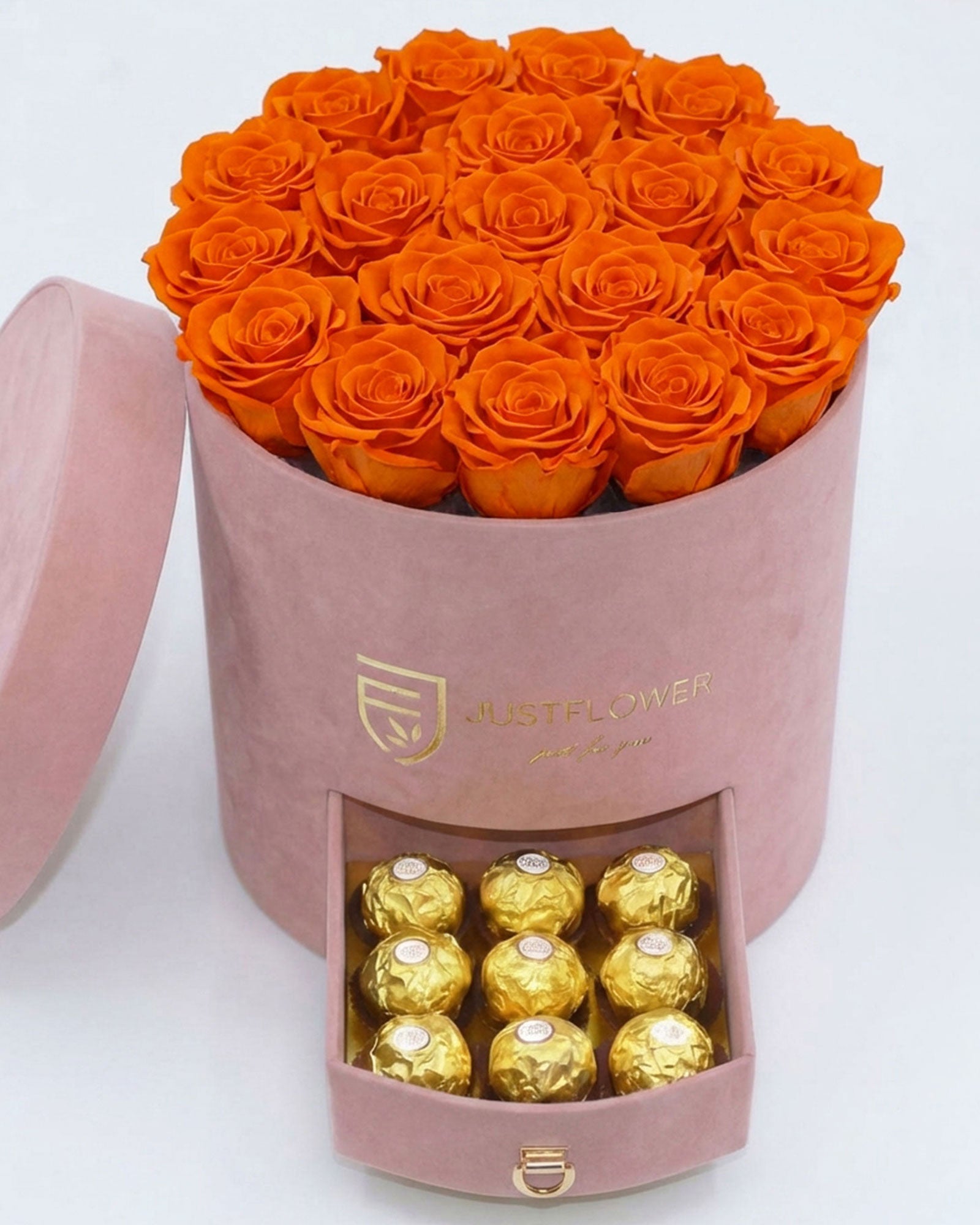 Rosenbox Rund Large Hellrosa Velvet mit orangefarbenen Infinity Rosen und Schublade – lebendige und auffällige Rosenbox