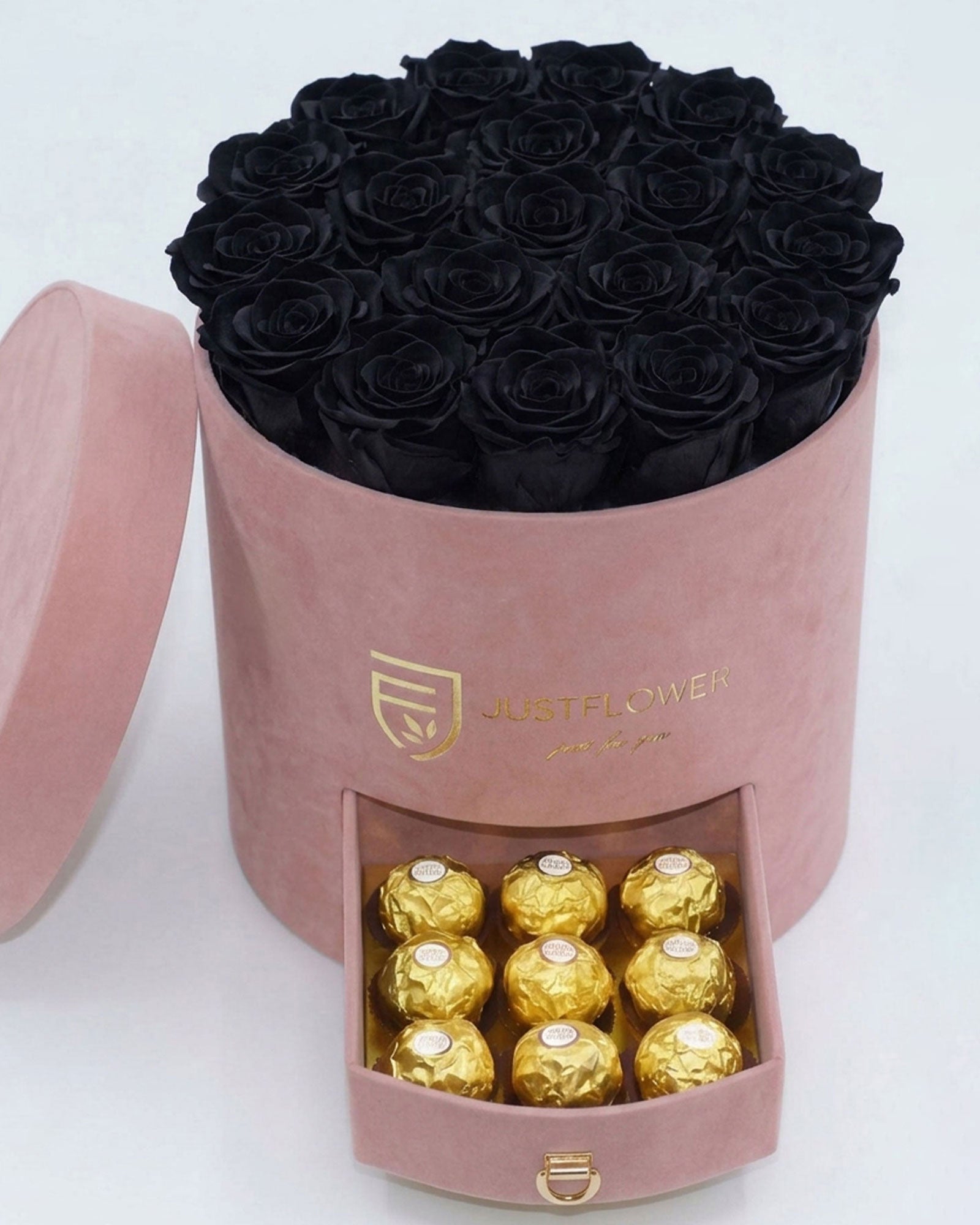 Rosenbox Rund Large Hellrosa Velvet mit schwarzen Infinity Rosen und integrierter Schublade – moderner Kontrast im eleganten Design