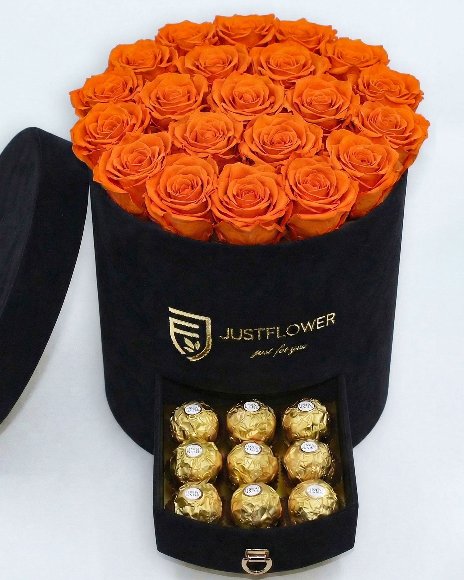 Rosenbox Rund Large Schwarz Velvet mit orangefarbenen Infinity Rosen und Schublade – lebendige und kontrastreiche Geschenkidee