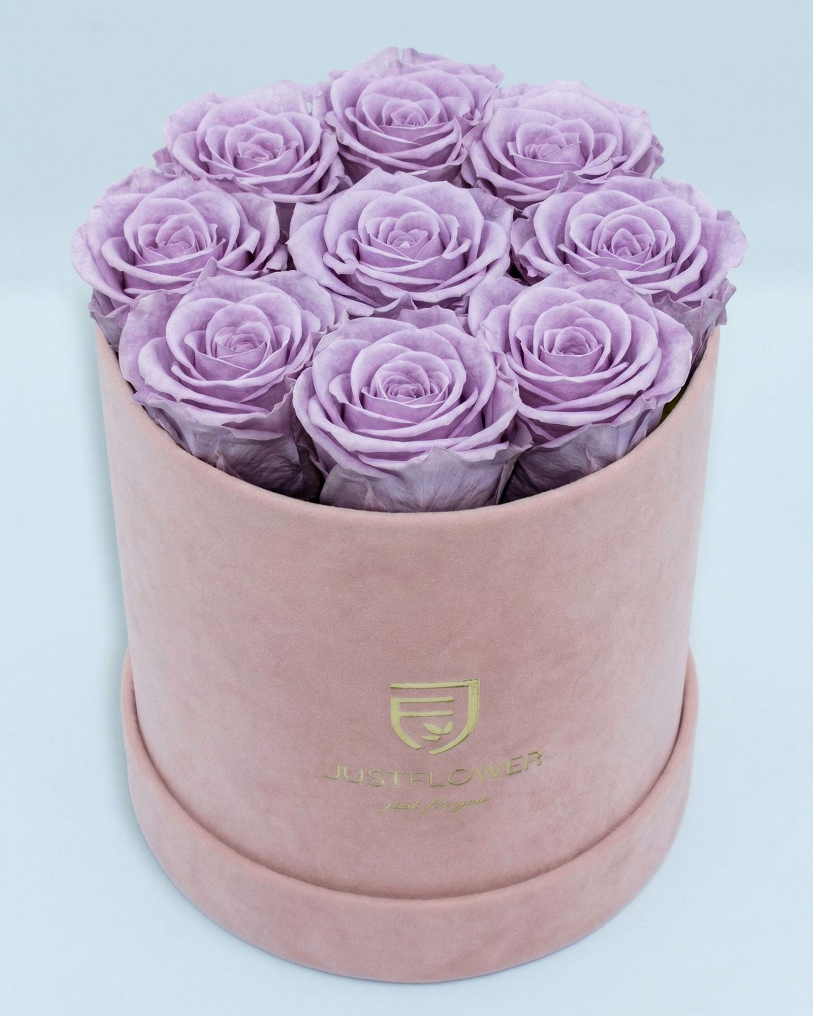 Rosenbox Rund Medium Hellrosa Velvet mit lila Infinity Rosen – auffällige und moderne Geschenkidee