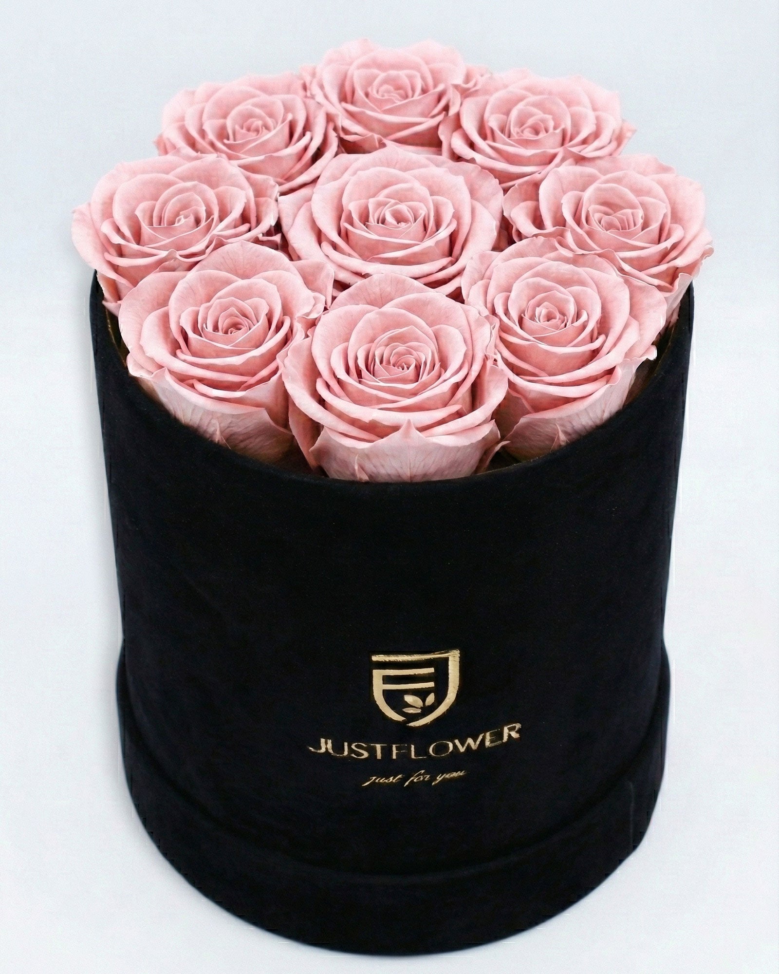 Rosenbox Rund Medium Schwarz Velvet mit hellrosa Infinity Rosen – harmonische Geschenkidee mit Kontrast