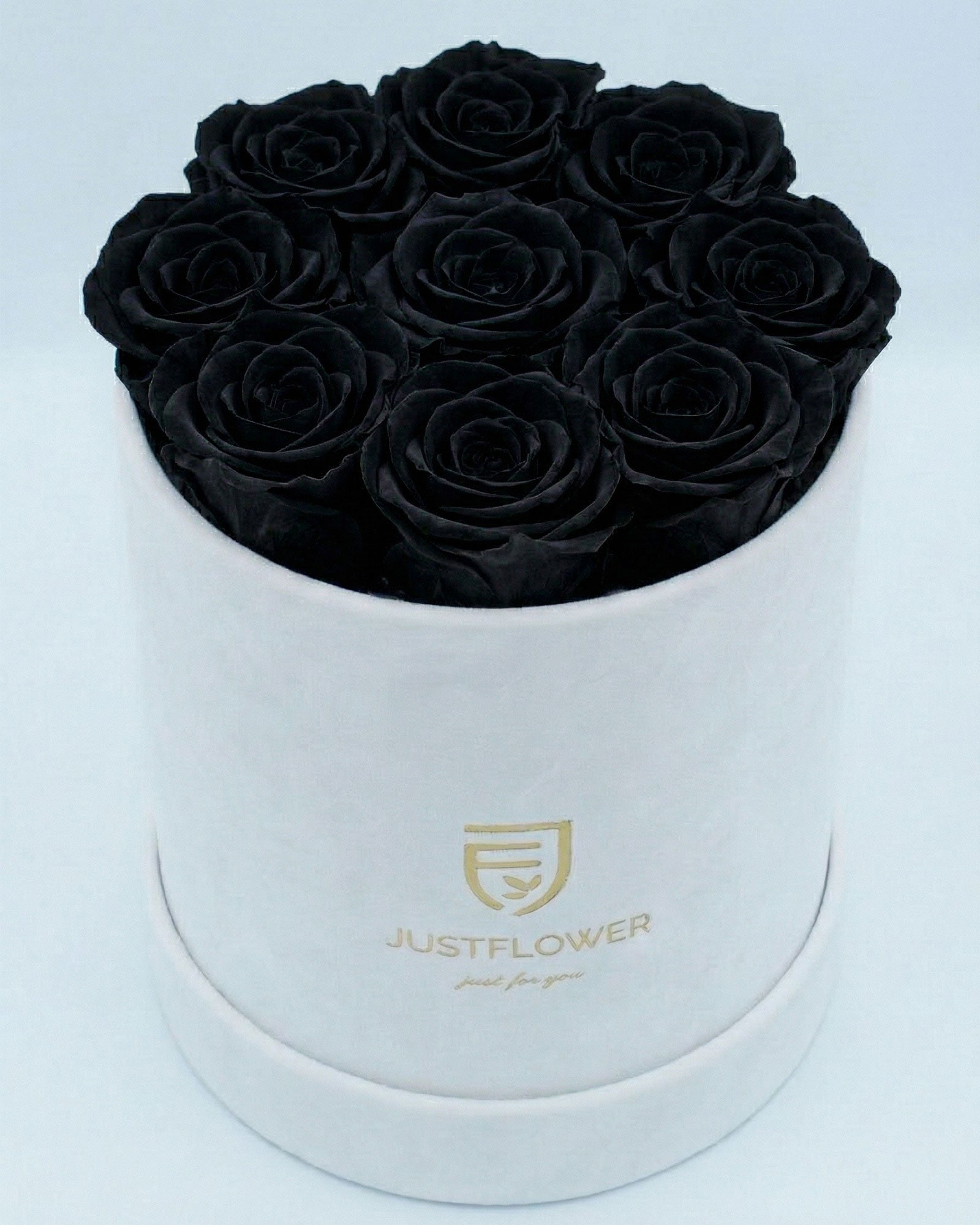 Rosenbox Rund Medium Weiss Velvet mit schwarzen Infinity Rosen – moderner und stilvoller Kontrast