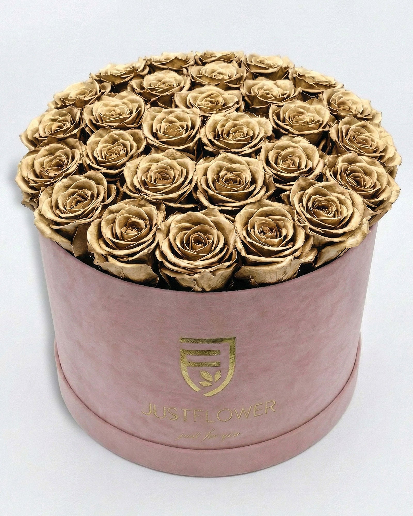 osenbox Rund XL in Hellrosa mit goldfarbenen Infinity Rosen – luxuriöse Rosenbox mit exklusivem Design.