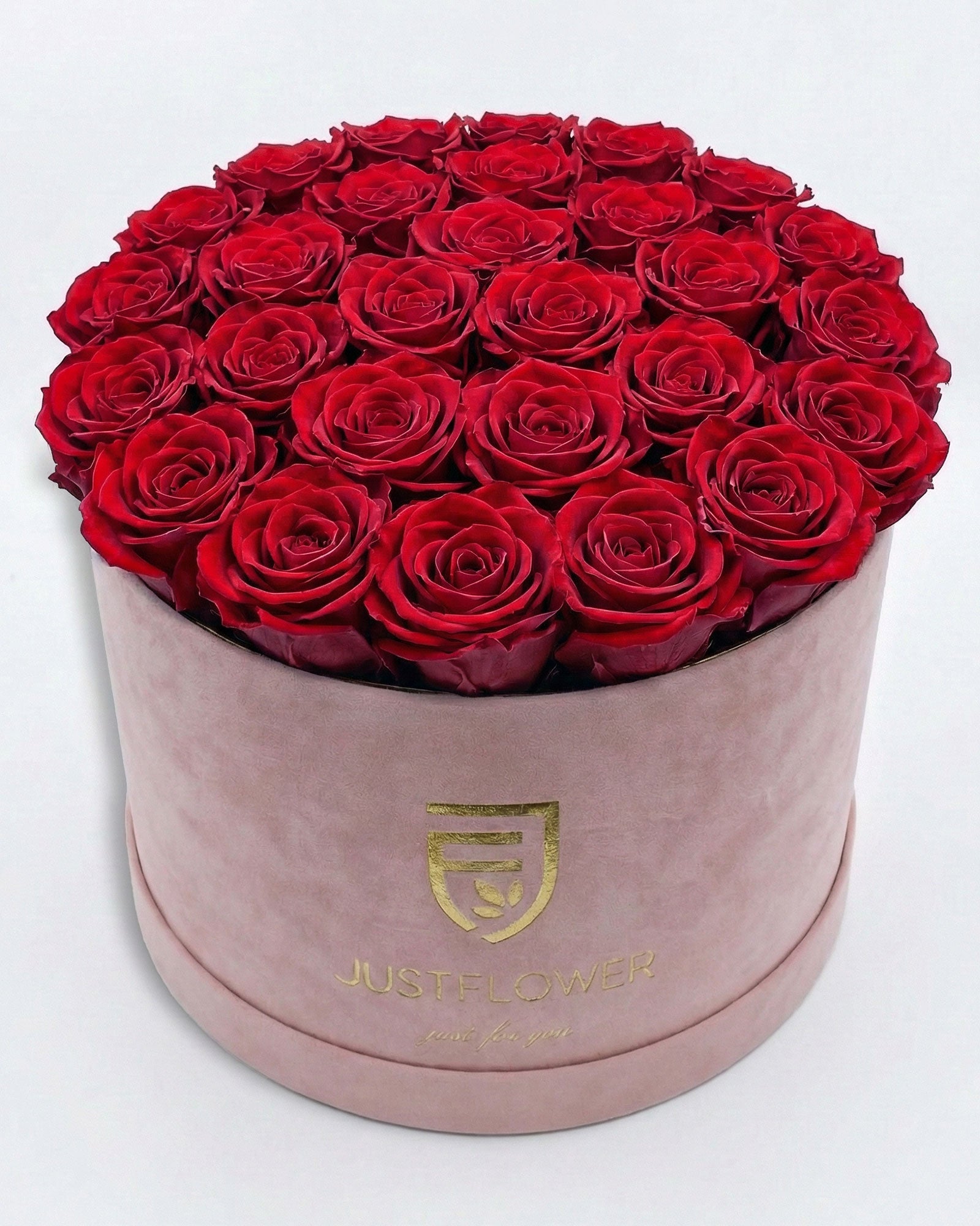 Rosenbox Rund XL in Hellrosa mit roten Infinity Rosen – elegante Rosenbox als Geschenk in der Schweiz kaufen.