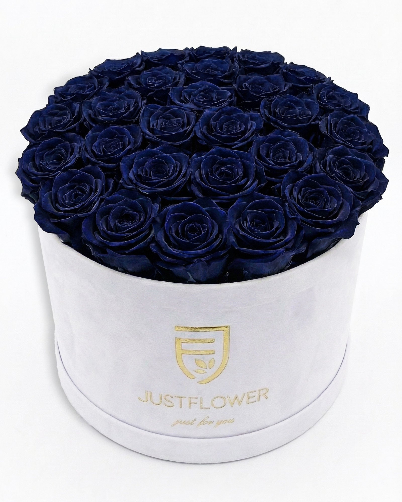 Rosenbox Rund XL in Weiss mit dunkelblauen Infinity Rosen – exklusive Rosenbox mit edlem Farbkontrast.