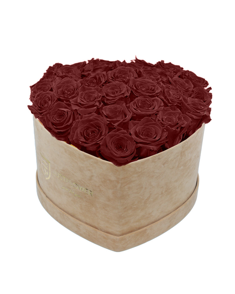 Rosenbox mit Infinity Rosen in Burgunder – Ein elegantes Rosenbox Herz aus konservierten burgunderroten Rosen, das für Leidenschaft und Eleganz steht. Perfekt für besondere Momente oder als edles Geschenk. Holen Sie sich diese exquisite Rosenbox bei JustFlower.ch.