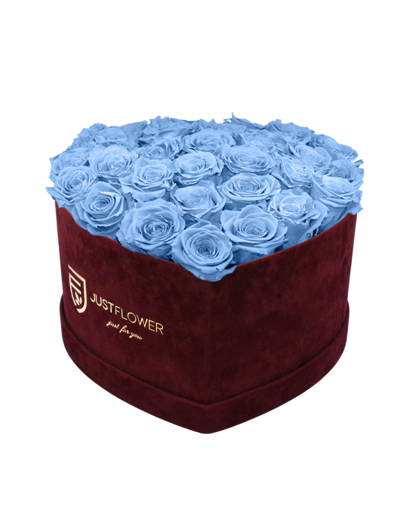 Rosenbox mit Infinity Rosen in Hellblau – Ein bezauberndes Herz aus konservierten blauen Rosen, das für Frieden und Zärtlichkeit steht. Perfekt für besondere Momente oder als exklusives Geschenk. Holen Sie sich diese edle Rosenbox bei JustFlower.ch.