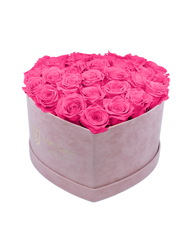 Rosenbox mit Infinity Rosen in Pink – Ein elegantes Rosebox Herz aus konservierten pinkfarbenen Rosen, das für Freude und Leidenschaft steht. Perfekt für besondere Anlässe oder als luxuriöses Geschenk. Bestellen, verschenken oder kaufen Sie diese edle Rosenbox bei JustFlower.ch.