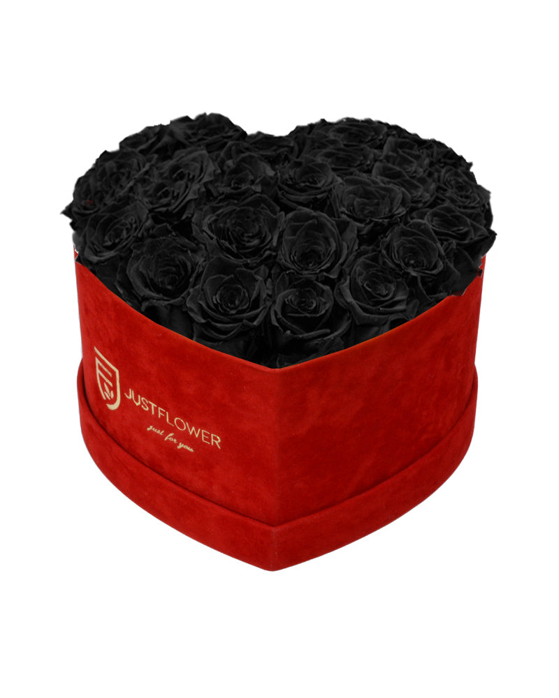 Rosenbox Herz mit Infinity Rosen in Schwarz – Diese elegante Rosenbox Herz ist mit Infinity Rosen gefüllt, die für ihre langanhaltende Schönheit bekannt sind. Die ewigen schwarzen Rosen symbolisieren Stärke und Geheimnis, während die konservierten Rosen eine zeitlose Eleganz ausstrahlen. Perfekt als außergewöhnliches Geschenk oder für besondere Anlässe. Bestellen, verschenken oder kaufen Sie diese edle Rosenbox bei JustFlower.ch.