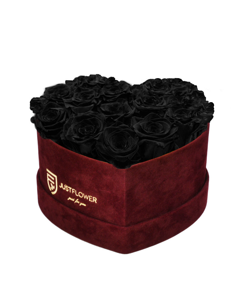 Rosenbox Herz mit Schwarzen Infinity Rosen – Diese edle Rosenbox in Burgunderrot ist gefüllt mit ewigen schwarzen Rosen, die eine mystische und elegante Atmosphäre verbreiten. Die konservierten Rosen behalten ihre Schönheit und Frische über lange Zeit ohne Pflegeaufwand. Bestellen Sie diese exklusive Infinity Rosenbox Herz mit ewigen schwarzen Rosen bei JustFlower.ch und überraschen Sie Ihre Liebsten mit einem außergewöhnlichen Geschenk.