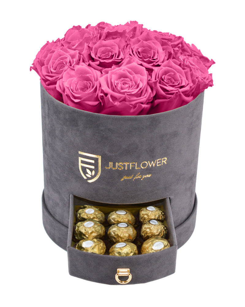 Rosenbox mit rosa Infinity Rosen – Graue Rosenbox mit konservierten rosa ewigen Rosen und einer Schublade voller Ferrero Rocher. Bestellen Sie diese luxuriöse Rosenbox bei JustFlower.ch für ein unvergessliches Geschenk.