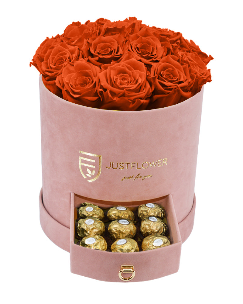Rosenbox mit orangen Infinity Rosen und Ferrero Rocher – Bestellen Sie jetzt diese exklusive Box mit ewigen Rosen und köstlichen Pralinen bei JustFlower.ch!