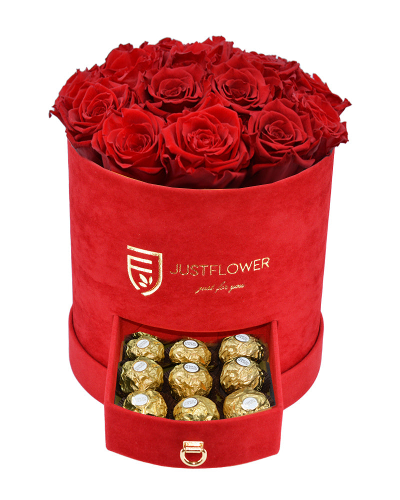 Rosenbox mit roten Infinity Rosen – Rote Rosenbox mit konservierten roten Rosen und einer Schublade voller Goldschokolade. Bestellen Sie diese luxuriöse Rosenbox bei JustFlower.ch für das ideale Geschenk.