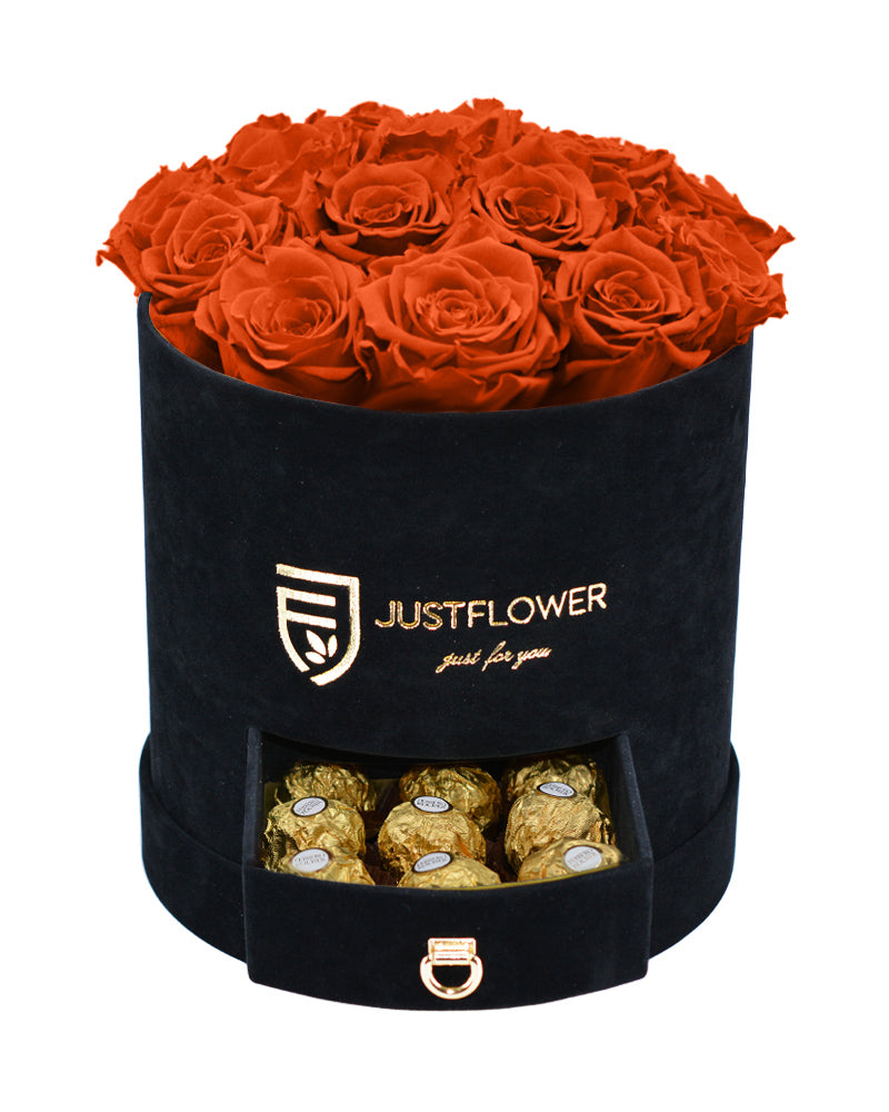 Rosenbox mit orangefarbenen konservierten Rosen und Schublade – Bestellen Sie diese edle Rosenbox bei JustFlower.ch und genießen Sie ewige Rosen in luxuriösem Design.
