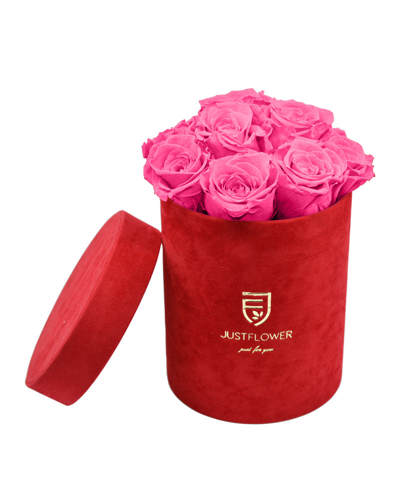 Rosenbox mit pinken konservierten Rosen. Bestellen Sie diese edle Rosenbox bei JustFlower.ch, ideal für unvergängliche Erinnerungen.